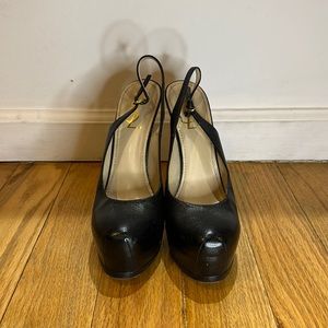 YSL 6-inch sling back black leather platform pumps. Size 39
